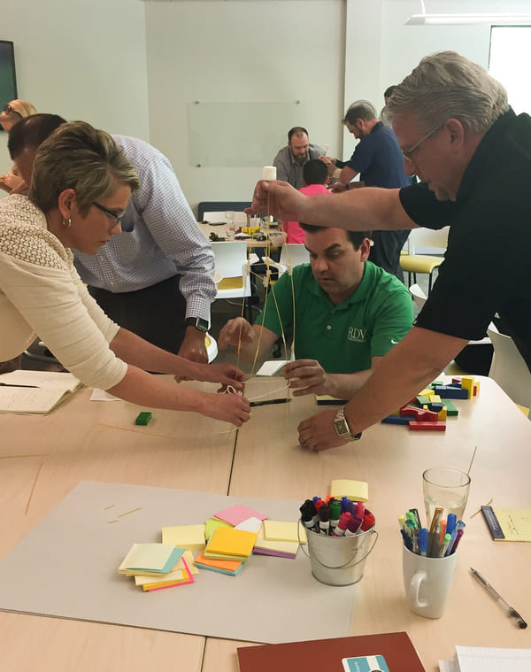 Teachers working on exercises during a Thought Design workshop