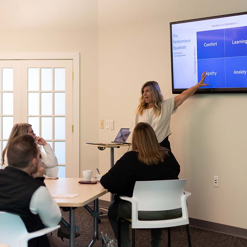 Denise presenting to course attendees 